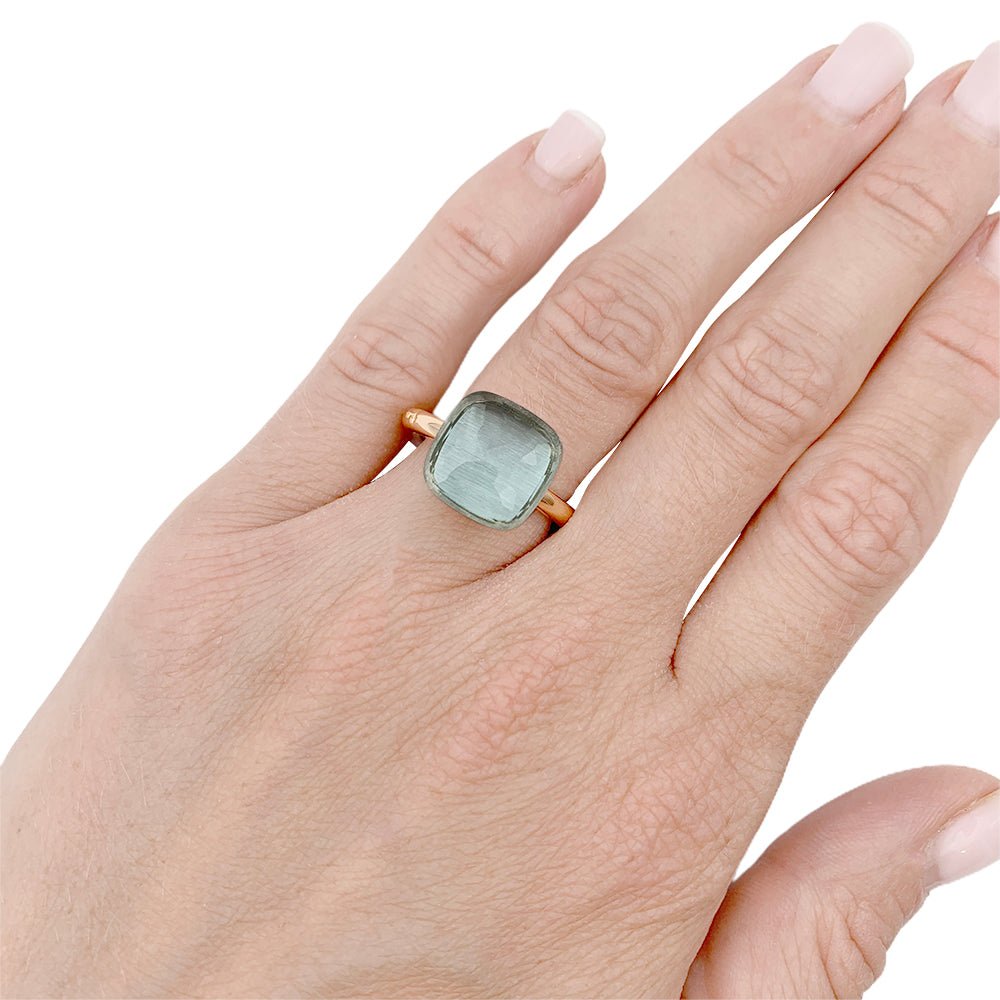 Bague Pomellato, "Nudo Maxi", deux ors et topaze bleue. - Castafiore