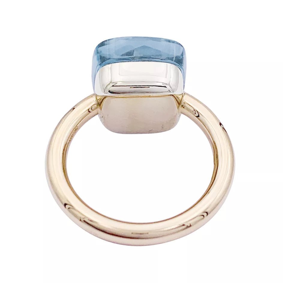 Bague Pomellato, "Nudo Maxi", deux ors et topaze bleue. - Castafiore