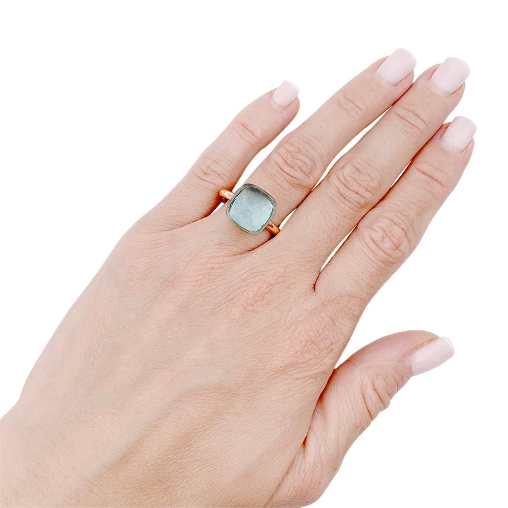 Bague Pomellato, "Nudo Maxi", deux ors et topaze bleue. - Castafiore