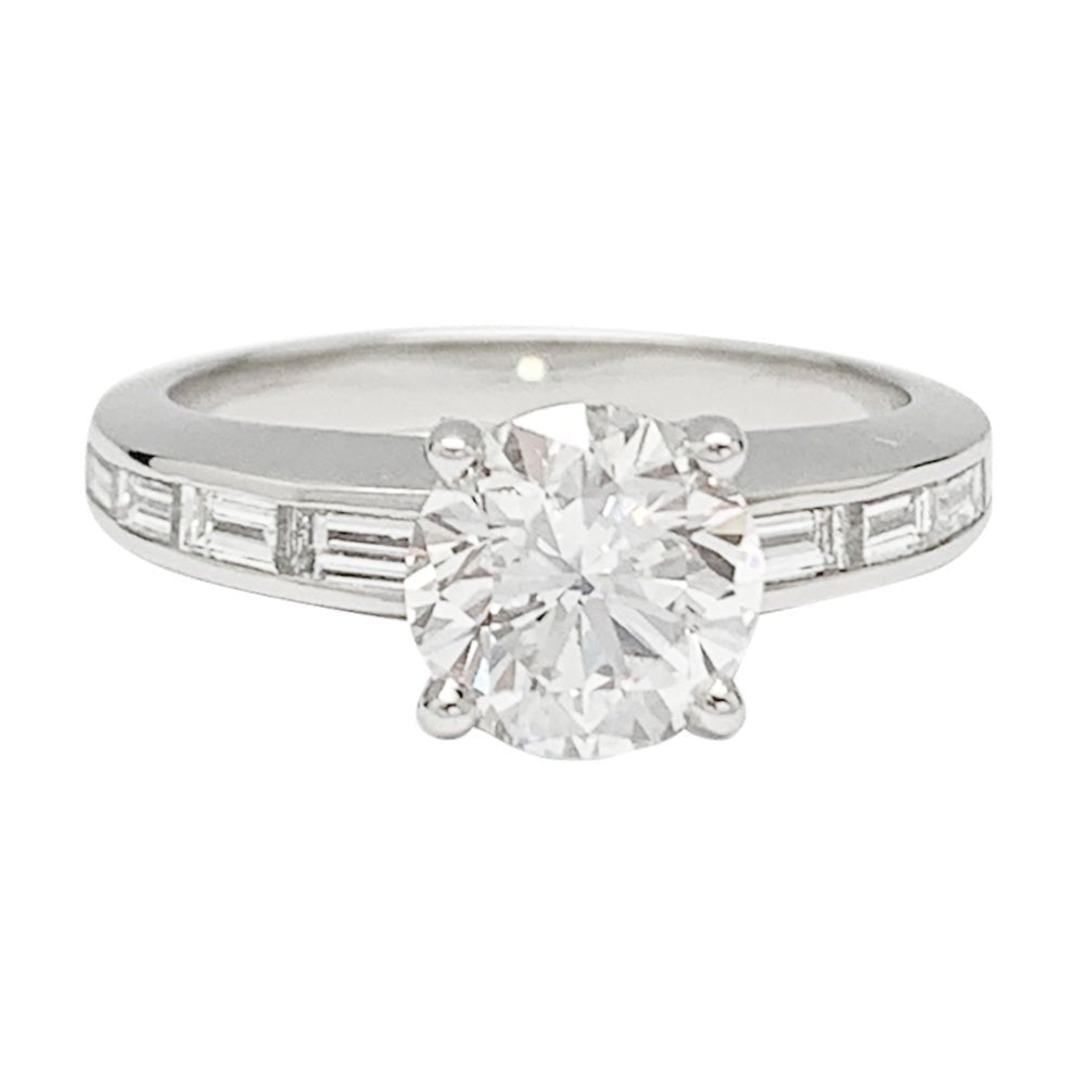 Bague solitaire accompagné diamants baguette - Castafiore