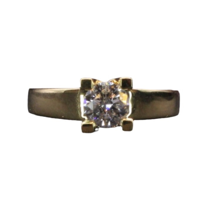 Bague solitaire diamant serti sur or jaune - Castafiore