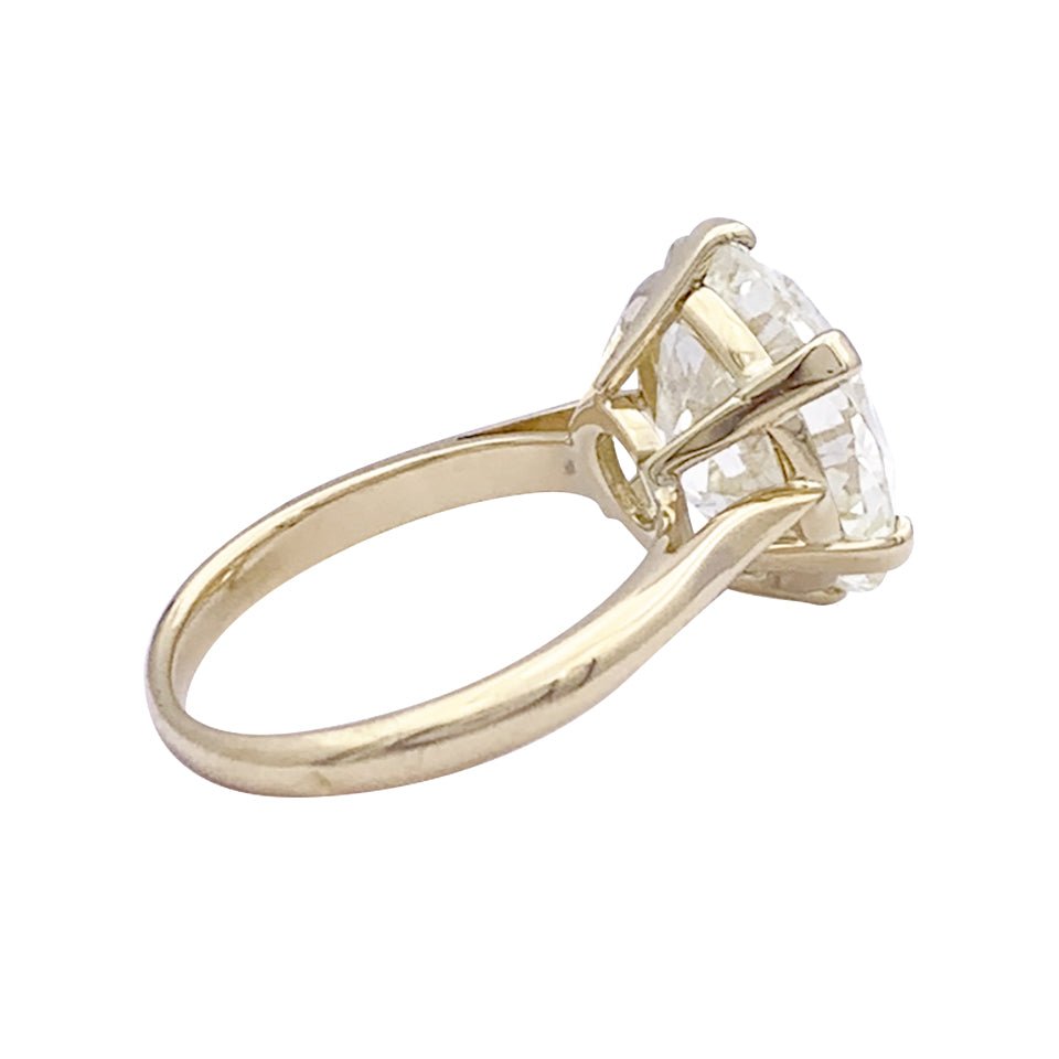 Bague solitaire, or jaune, diamant 7,59 carats. - Castafiore