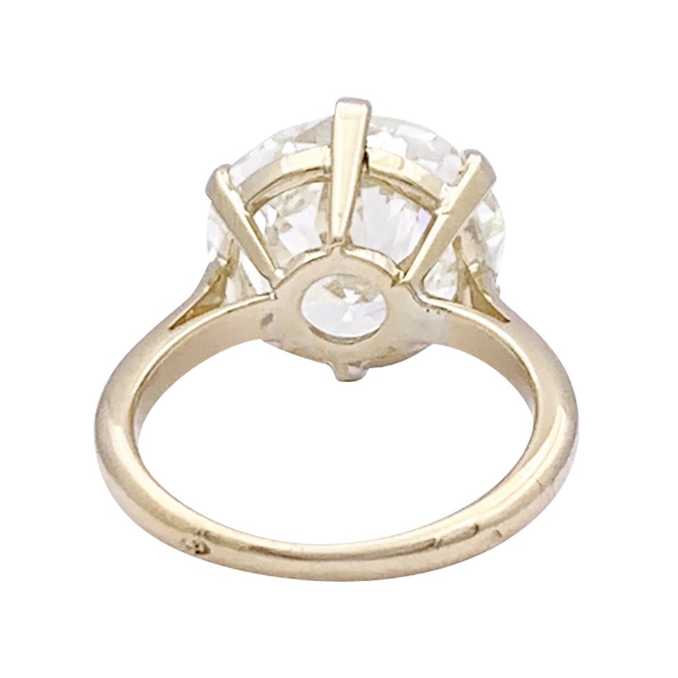 Bague solitaire, or jaune, diamant 7,59 carats. - Castafiore