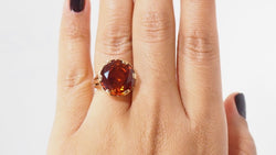 Bague vintage en or rose et saphir orange - Castafiore