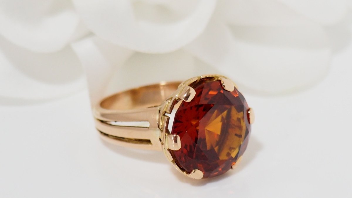 Bague vintage en or rose et saphir orange - Castafiore