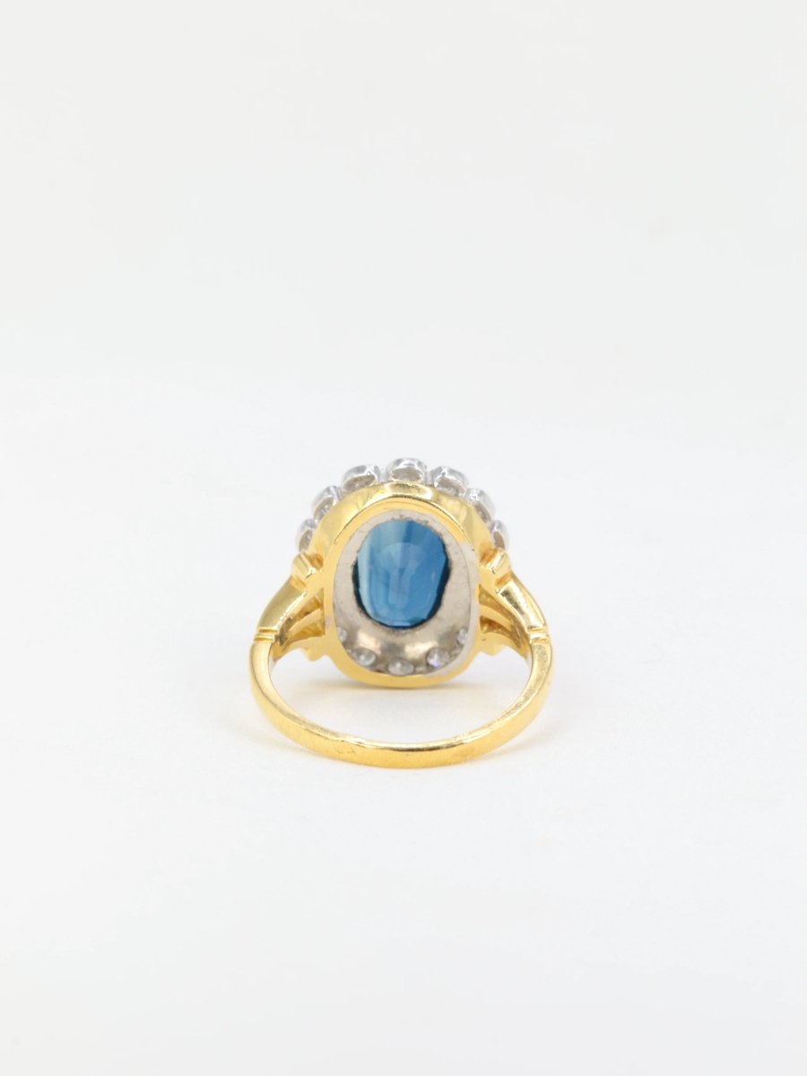 Bague vintage marguerite en or, saphir et diamants - Castafiore