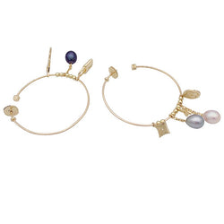 Boucles d'oreille Créoles LOUIS VUITTON "Monogram" en or jaune et perles - Castafiore