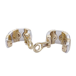 Boucles d'oreilles BULGARI "Parentesi" en or jaune et acier. - Castafiore