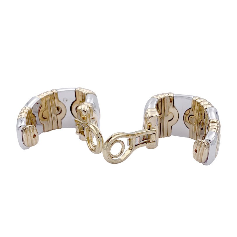 Boucles d'oreilles BULGARI "Parentesi" en or jaune et acier. - Castafiore