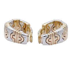 Boucles d'oreilles BULGARI "Parentesi" en or jaune et acier. - Castafiore