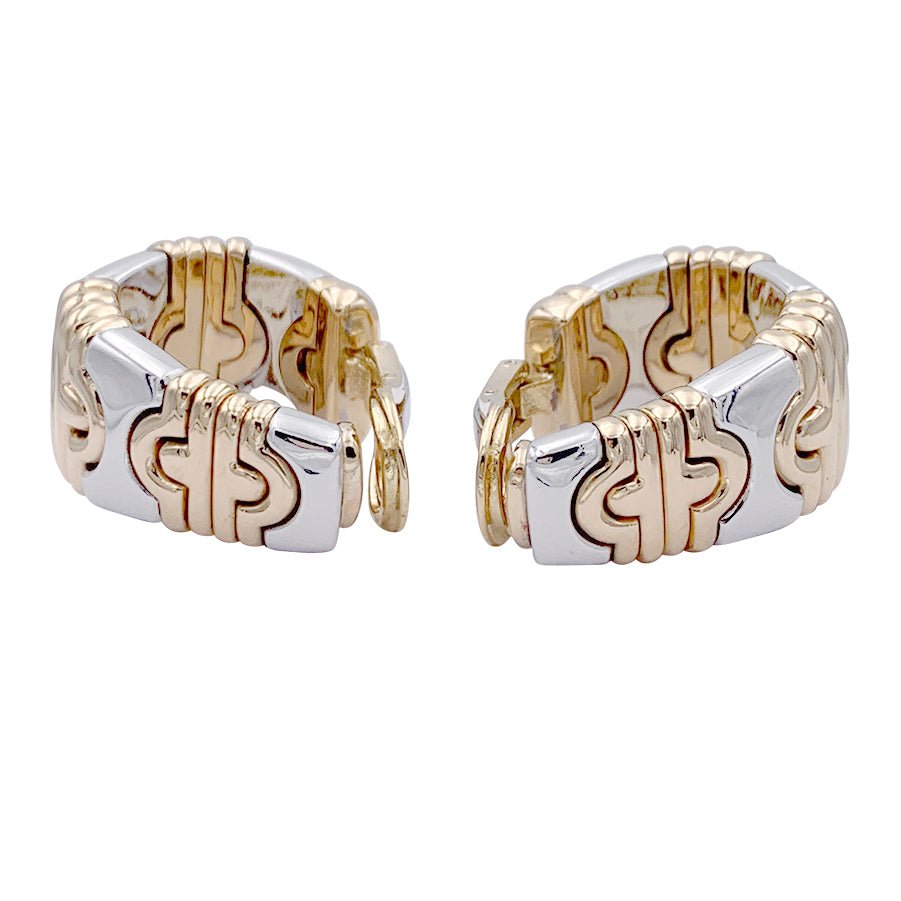 Boucles d'oreilles BULGARI "Parentesi" en or jaune et acier. - Castafiore
