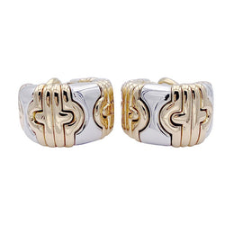 Boucles d'oreilles BULGARI "Parentesi" en or jaune et acier. - Castafiore