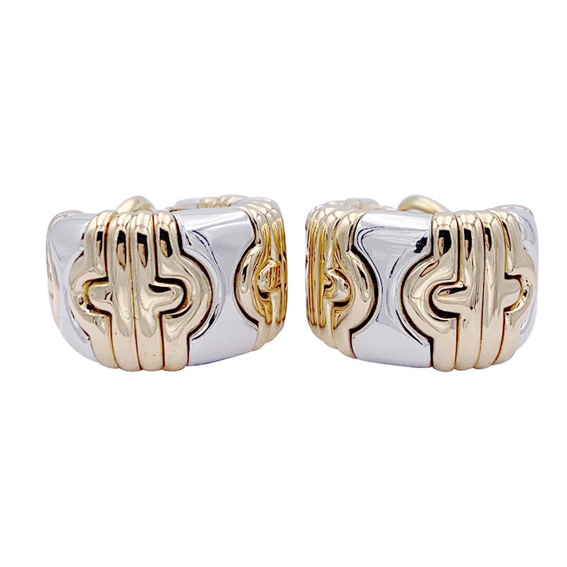 Boucles d'oreilles BULGARI "Parentesi" en or jaune et acier. - Castafiore