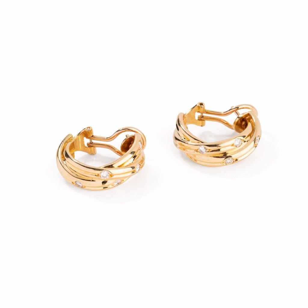 Boucles d'oreilles CARTIER, "collection trinity stars" en or jaune - Castafiore
