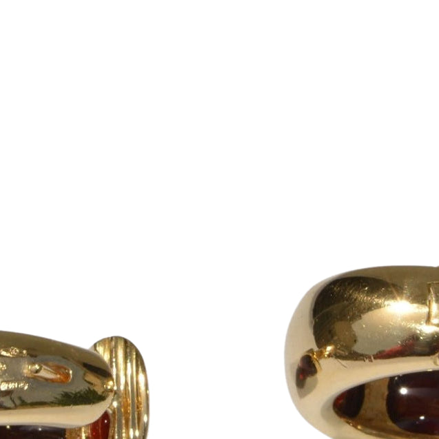 Boucles d'oreilles en or jaune de la maison Pomellato avec des cabochons de grenats - Castafiore