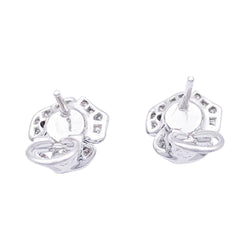 Boucles d'oreilles, "Fleurs", or blanc, diamants. - Castafiore
