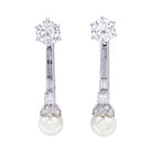 Boucles d'oreilles pendantes or blanc, platine, perles et diamants - Castafiore