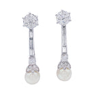 Boucles d'oreilles pendantes or blanc, platine, perles et diamants - Castafiore