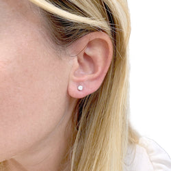 Boucles d'oreilles Puces TIFFANY & CO. en platine et diamants - Castafiore