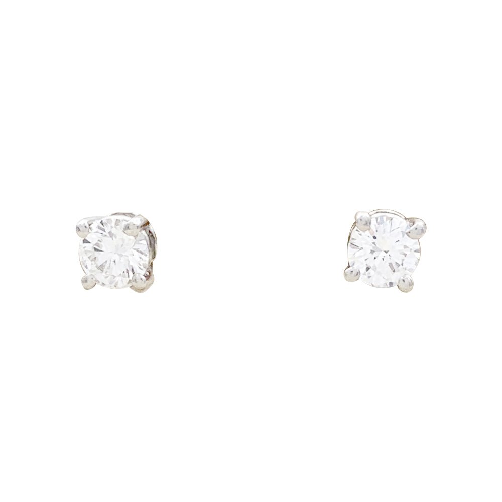Boucles d'oreilles Puces TIFFANY & CO. en platine et diamants - Castafiore