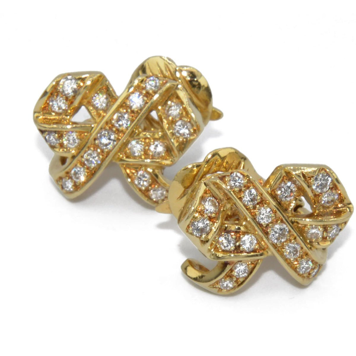Boucles d'oreilles signée de la maison Dior en or jaune et diamant - Castafiore