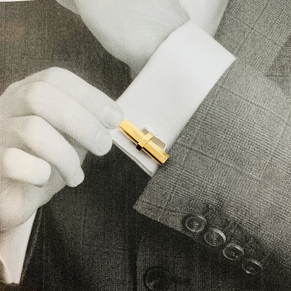 Boutons de manchette CARTIER en or jaune, acier et onyx - Castafiore