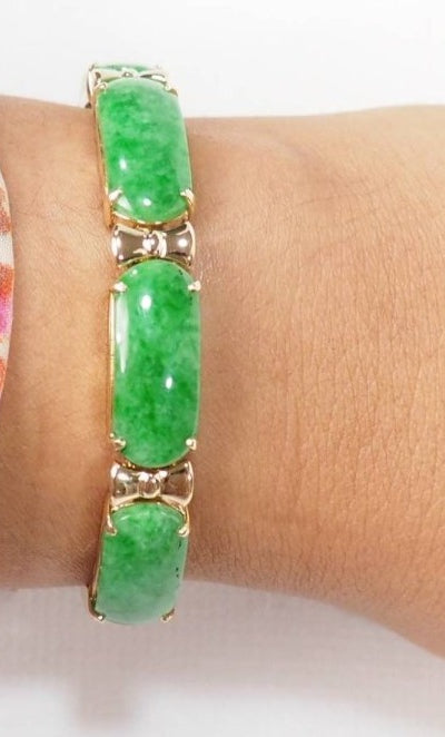Bracelet articulé en or jaune, jade et diamants - Castafiore