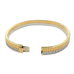 Bracelet Boucheron, "Quatre Radiant" , en or jaune, blanc et diamants - Castafiore