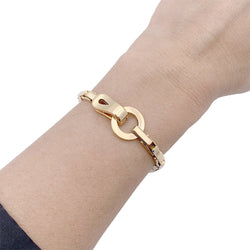Bracelet Cartier "Agrafe" en or jaune. - Castafiore