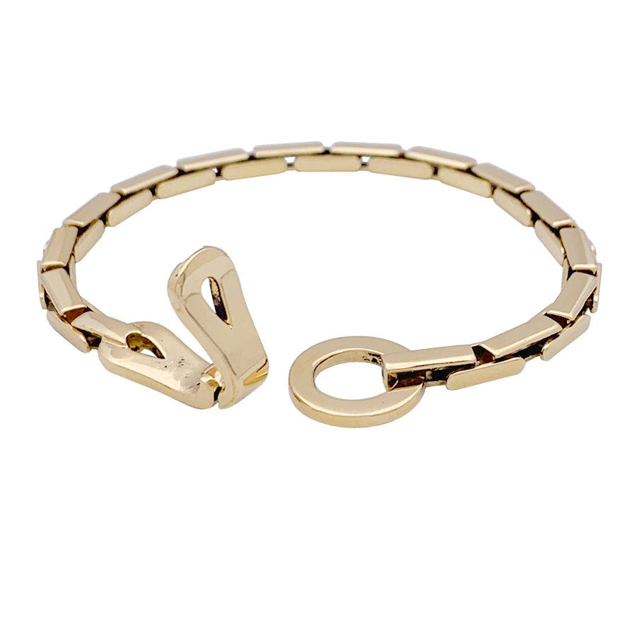 Bracelet Cartier "Agrafe" en or jaune. - Castafiore