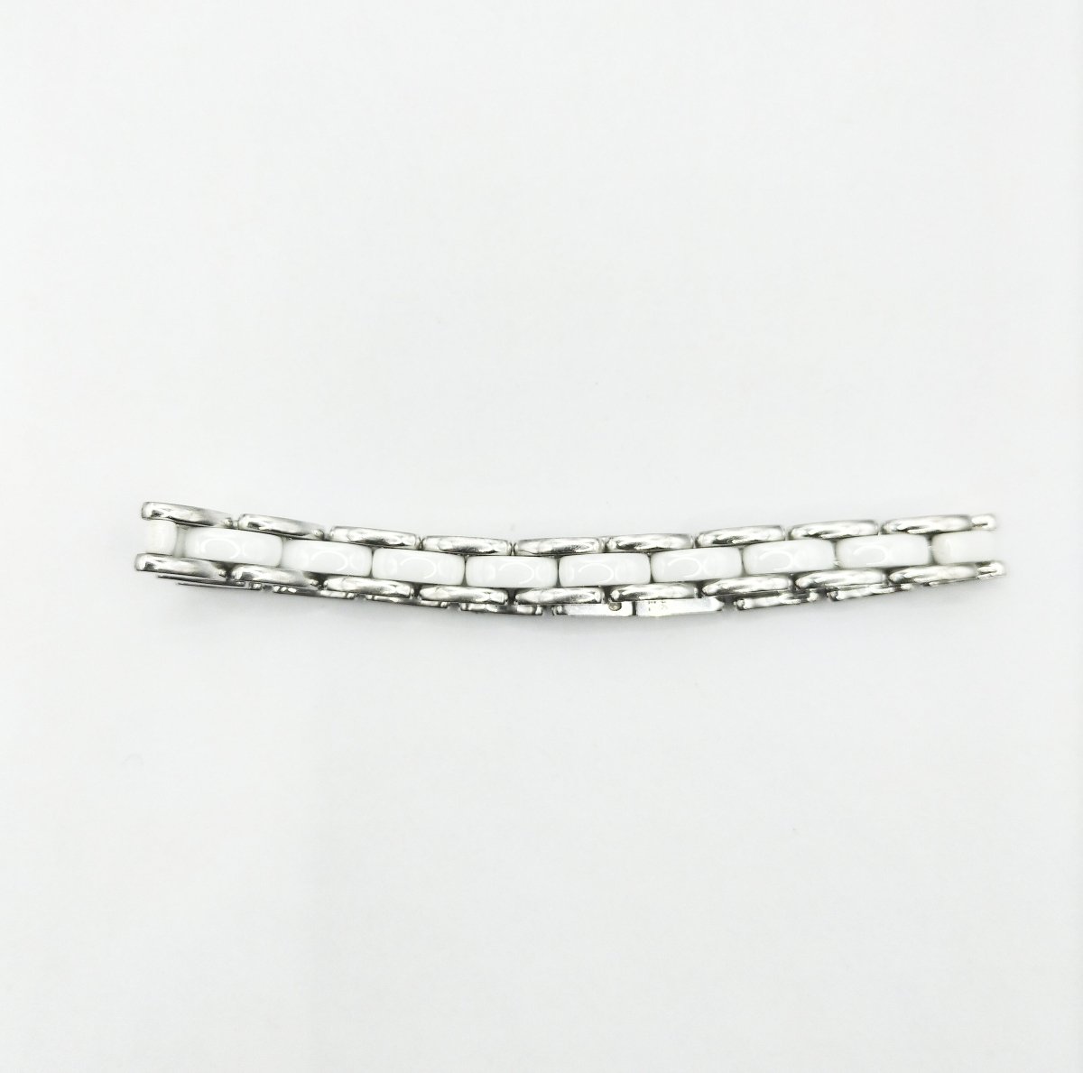 Bracelet CHANEL "Ultra", en or blanc et céramique blanche - Castafiore
