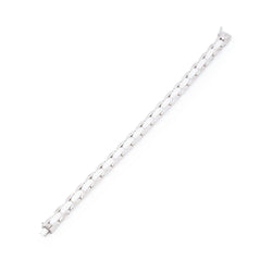 Bracelet CHANEL "Ultra", en or blanc et céramique blanche - Castafiore