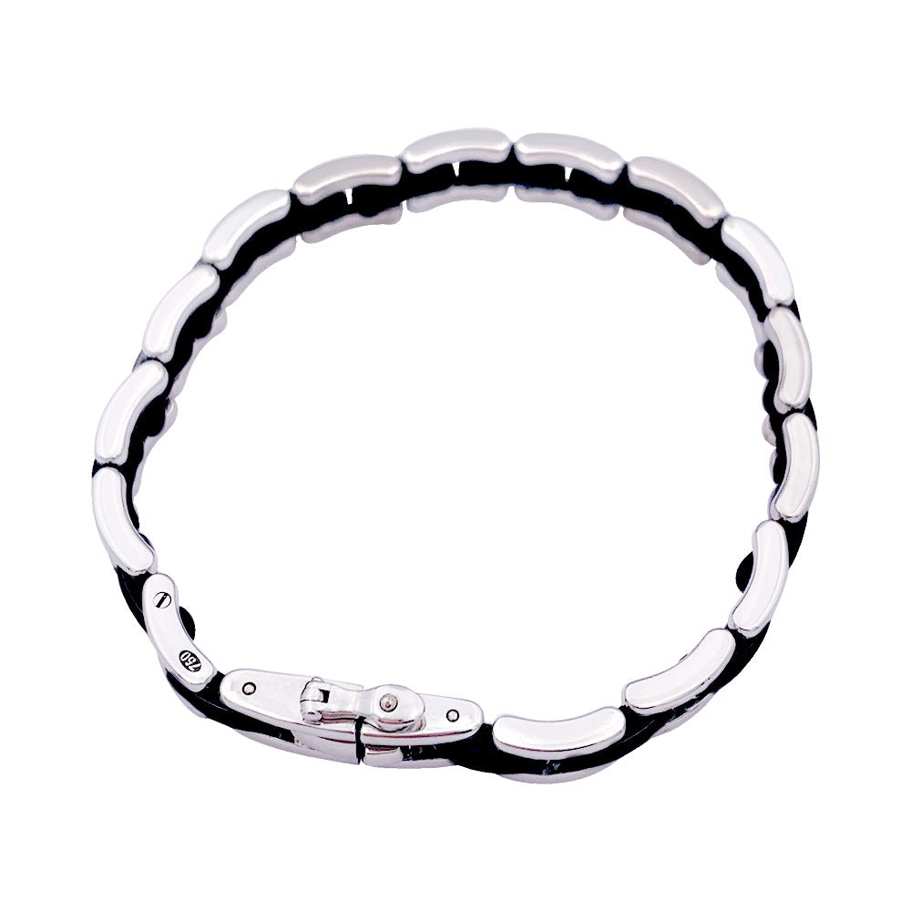 Bracelet Chanel, "Ultra", or blanc et céramique. - Castafiore