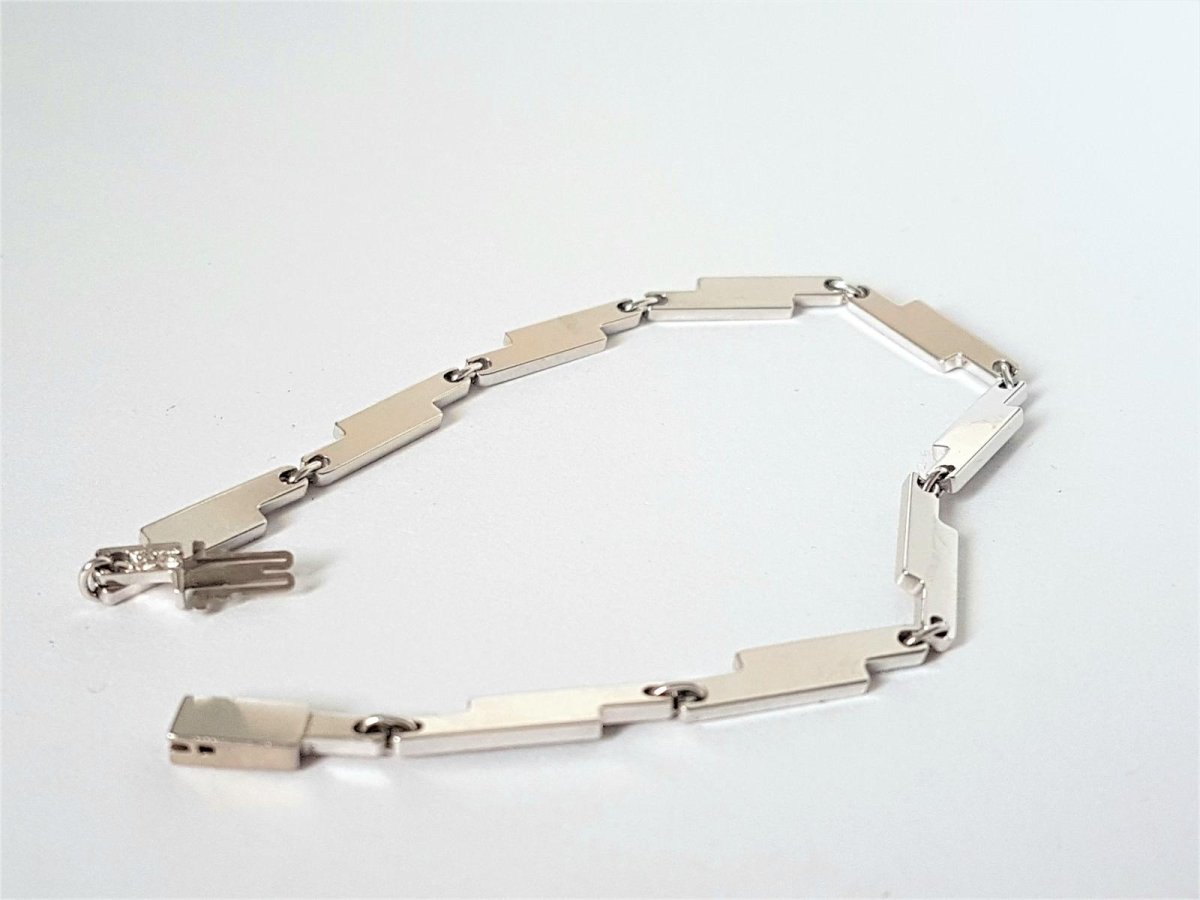 Bracelet DINH VAN "Seventies", en or blanc serti diamants - Castafiore
