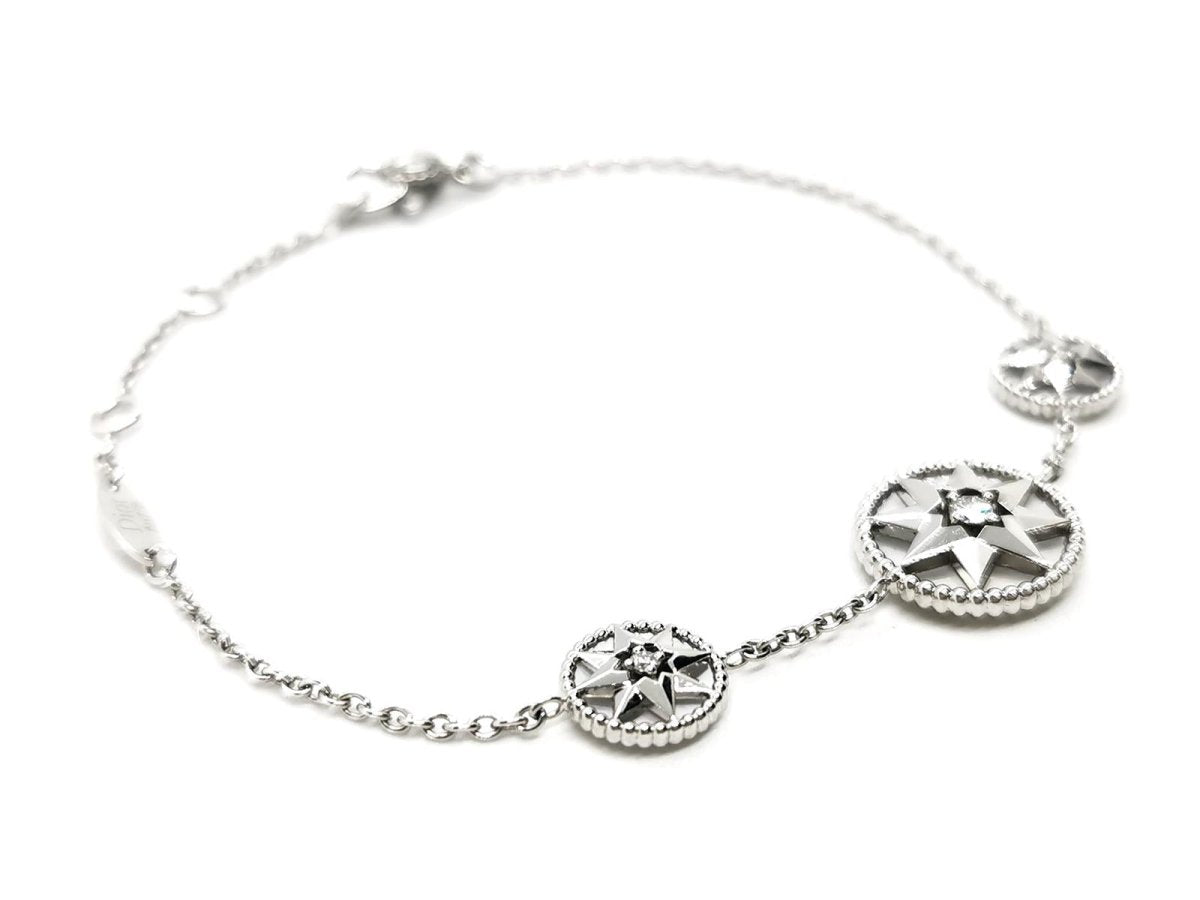 Bracelet DIOR "Rose des vents", or blanc, nacre et diamant - Castafiore