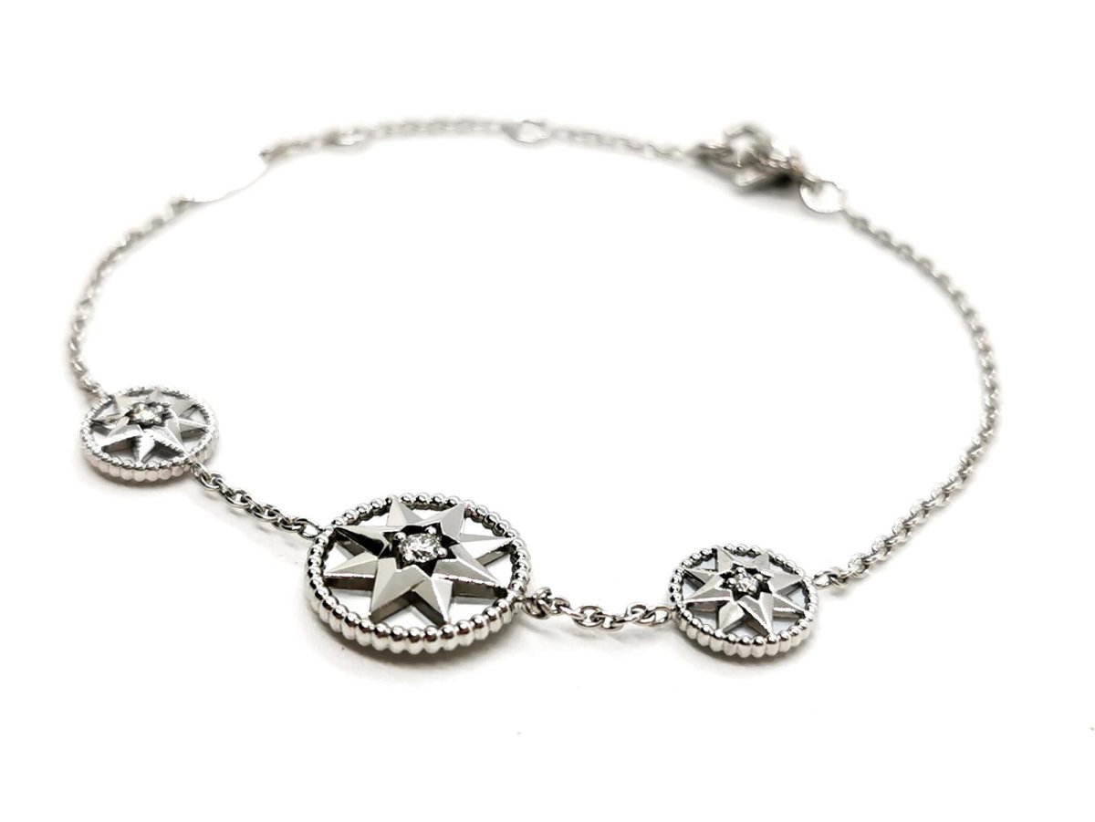 Bracelet DIOR "Rose des vents", or blanc, nacre et diamant - Castafiore
