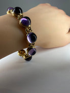 Bracelet en or 18 carats orné de 9 améthystes en cabochon - Castafiore