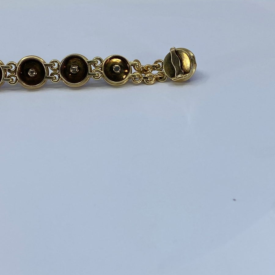 Bracelet en or 18 carats orné de 9 améthystes en cabochon - Castafiore
