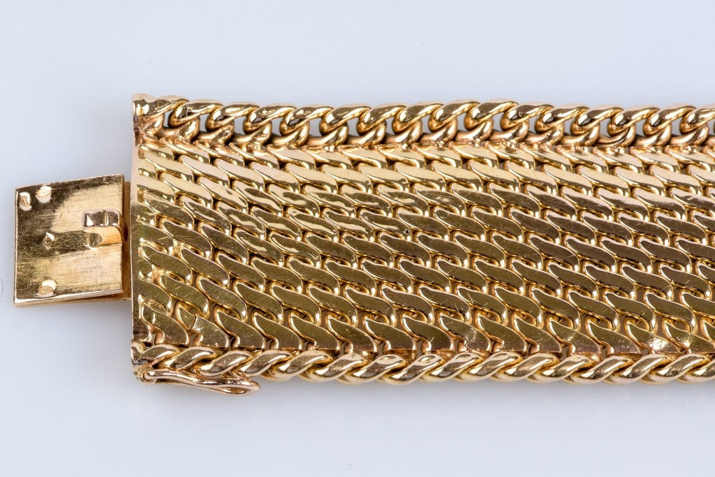 Bracelet en or jaune 18 carats en maille serpentine avec fermoir cliquet. - Castafiore