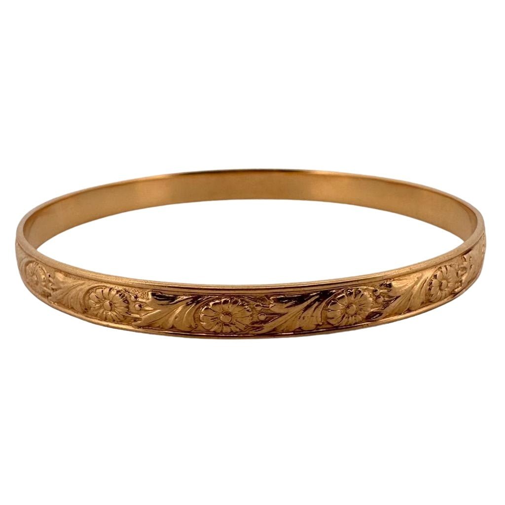 Bracelet en or jaune à décor gravé de fleurs - Castafiore