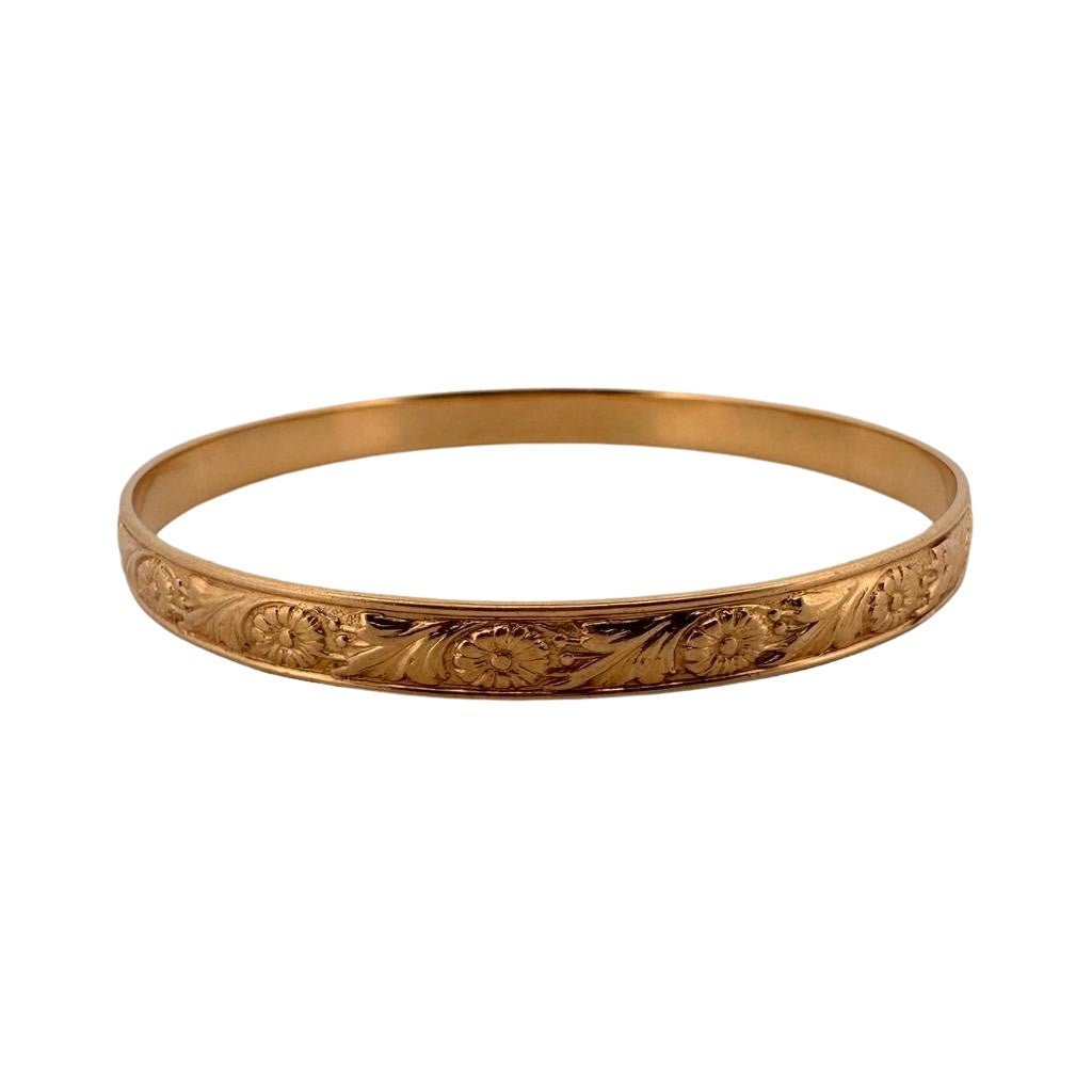 Bracelet en or jaune à décor gravé de fleurs - Castafiore