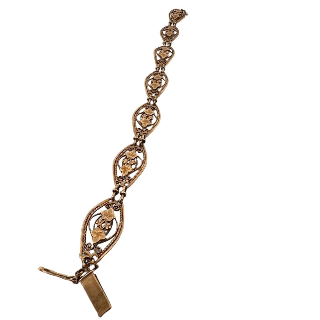 Bracelet en or jaune à maillons à décor de feuillages - Castafiore