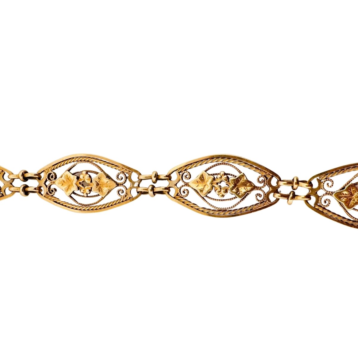 Bracelet en or jaune à maillons à décor de feuillages - Castafiore