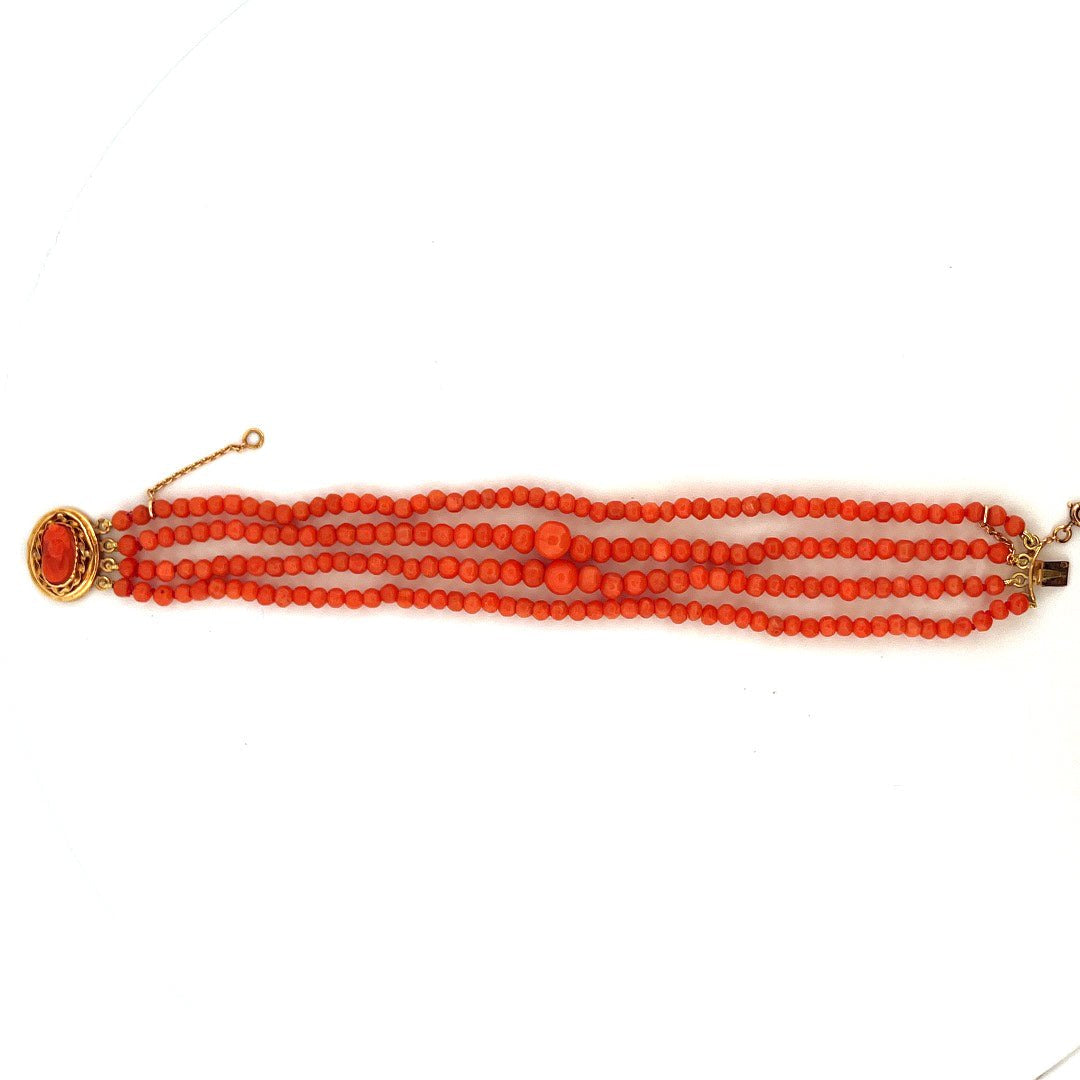 Bracelet en or jaune à rangs de perles de corails - Castafiore
