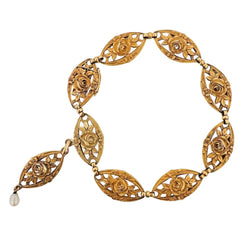 Bracelet en or jaune avec maillons à décor floral - Castafiore