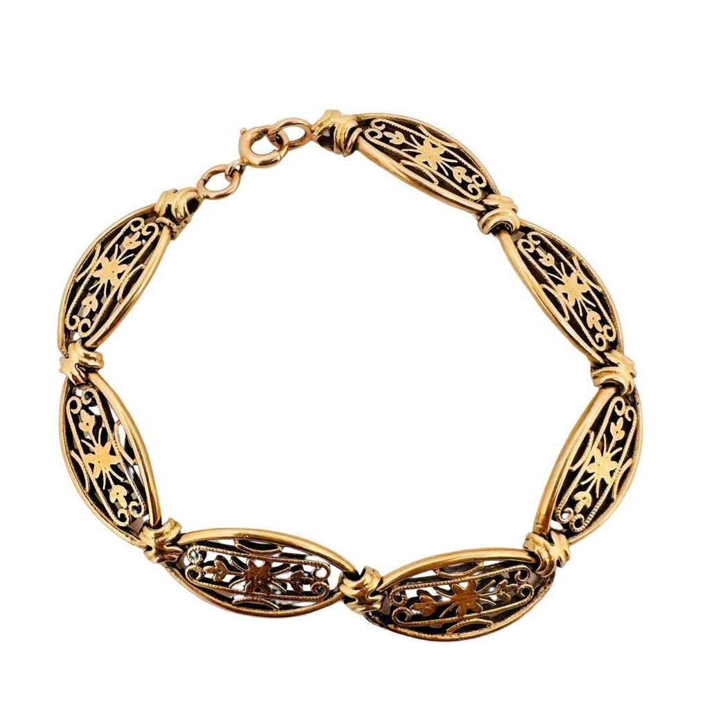 Bracelet en or jaune avec maillons ovales à décor de formes géométriques - Castafiore