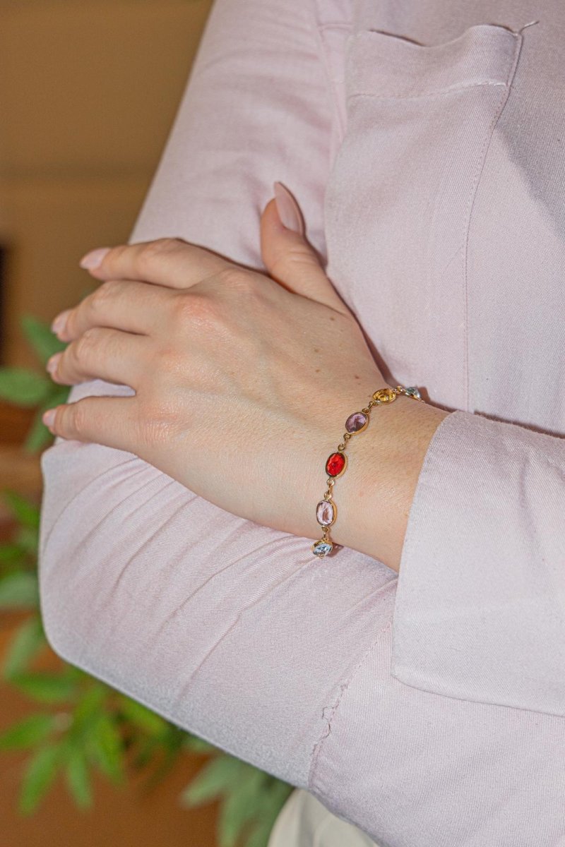 Bracelet en or jaune et pierres fines. - Castafiore