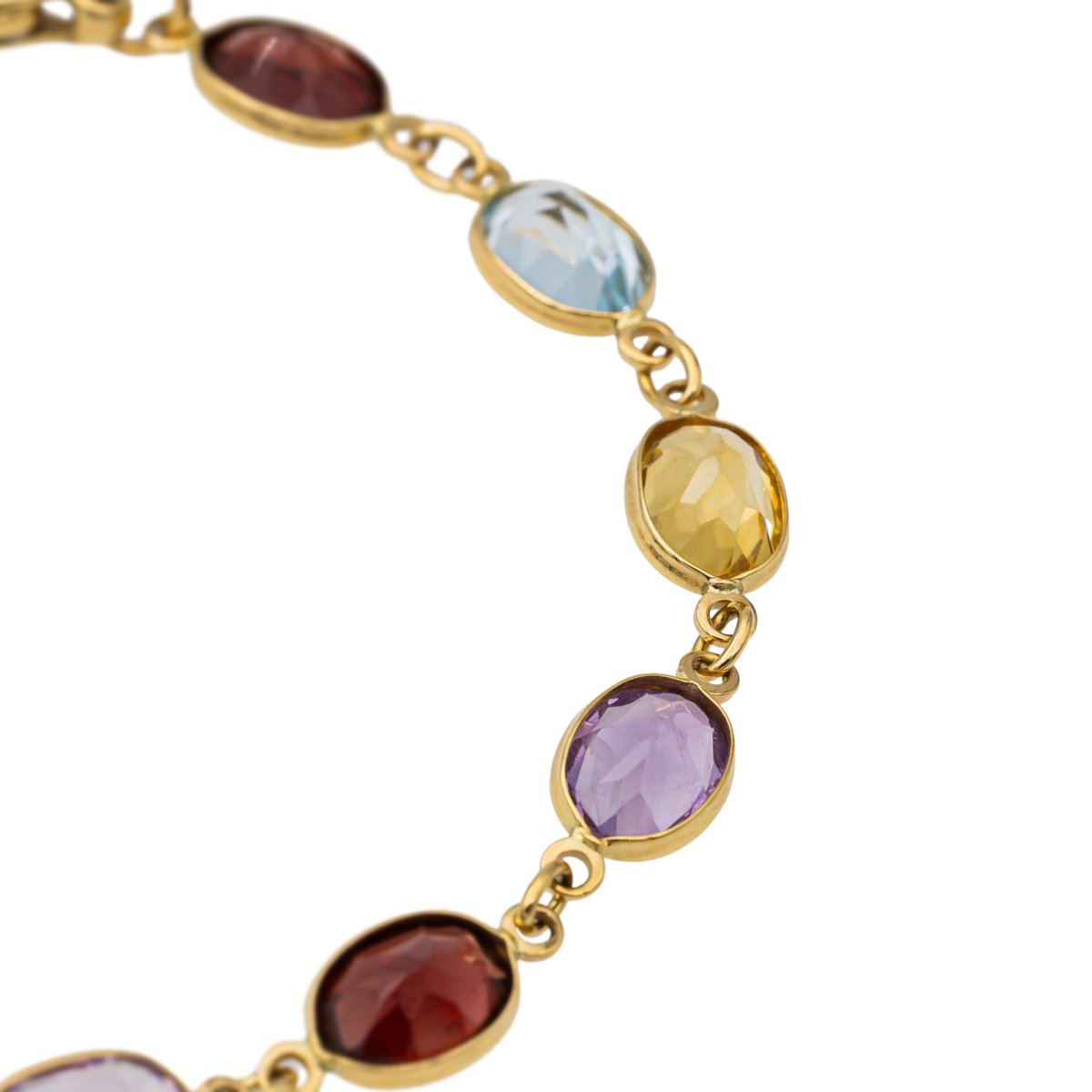 Bracelet en or jaune et pierres fines. - Castafiore