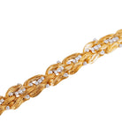 Bracelet feuillages en or jaune, platine et diamants - Castafiore
