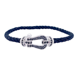 Bracelet FRED "Force 10" en or blanc, acier et diamants noirs - Castafiore